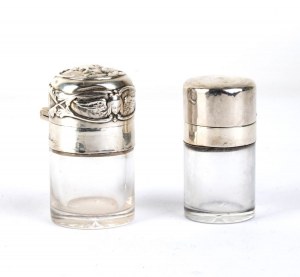A pair of cut crystal and sterling silver bottles