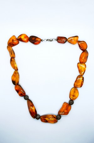 Gorgeous transparent natural amber necklace with openwork elements