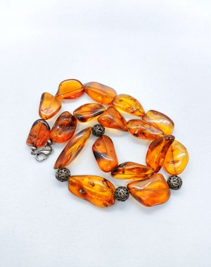 Gorgeous transparent natural amber necklace with openwork elements