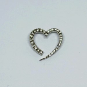 Silver pendant in the form of a heart with white zircons