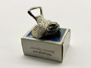 Silver-plated opener in the form of a bird in original packaging