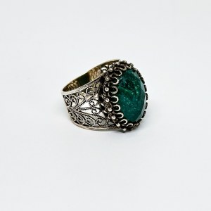 Large silver openwork ring with natural Emerald
