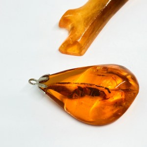 Brooch and pendant made of amber