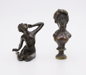 A pair of figurines [so-called desk accessories].