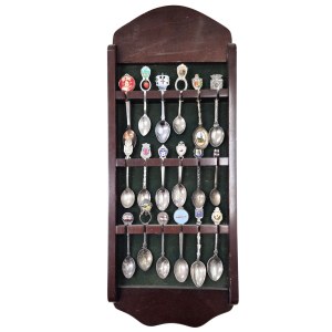 Set of collectible spoons in a wooden display case