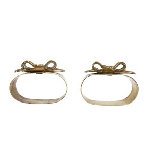 A pair of decorative napkin rings