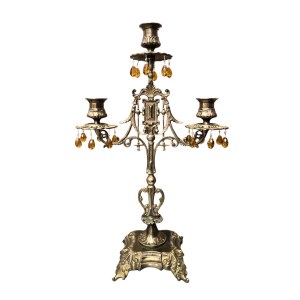 A pair of decorative candle holders
