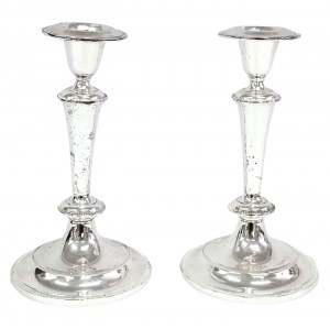 A pair of classic candle holders