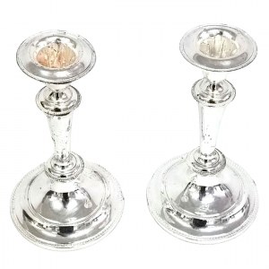 A pair of classic candle holders