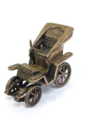 Silver replica of the first Fiat 4 HP model