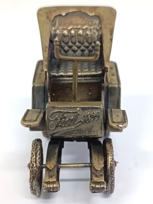 Silver replica of the first Fiat 4 HP model