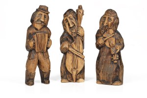 Wood carvings: trio of musicians