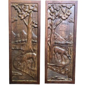 Pair of carved panels with deer and doe motifs, 20th century.