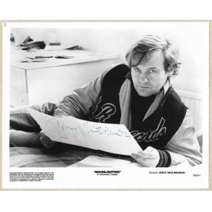 [SKOLIMOWSKI Jerzy]. Signature of Jerzy Skolimowski on a still from the film Moonlightning (Polish: Moonlightning)....
