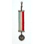 [watch pendant]. A pendant consisting of a patriotic metal tag, a ribbon of blue, white and...