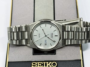 Seiko SQ100 35mm men's watch with original Seiko box