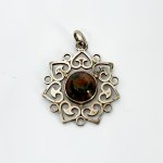 Eastern style silver pendant with mossy agate