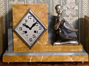 Art Deco mantel clock with figure of a woman with a rose - France first half of the 20th century