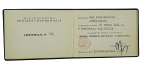 Legitimation of the Medal of the National Education Commission, dated October 3, 1973.