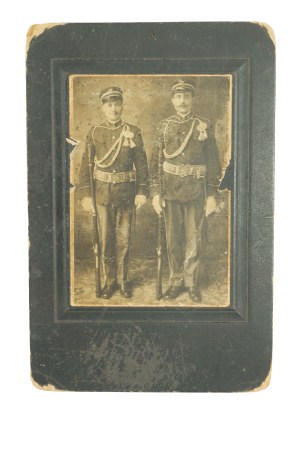 [Poles in the U.S. Army] Cardboard photograph, CDV showing two Polish expatriates in U.S. Army uniforms with guns at their feet