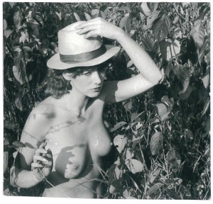 ACT. Woman wearing a hat.