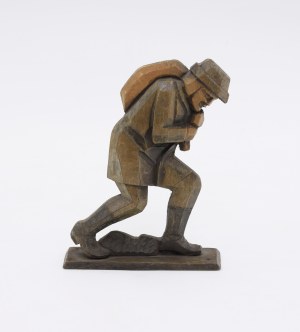 Man carrying a sack - deep relief