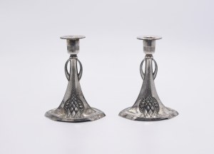 A pair of Art Nouveau type candle holders
