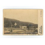 (KRESY). Rural landscape with a church in the background.