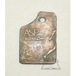 (ASP) Commemorative plaque from the Academy of Fine Arts in Kraków.
