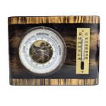 Vintage thermometer and barometer with visible mechanism