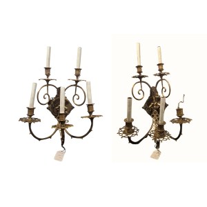 A pair of decorative wall sconces