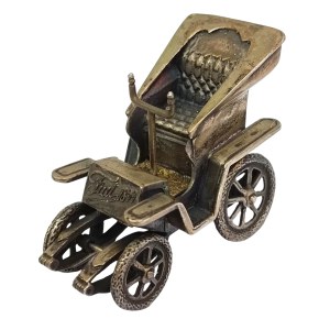 Silver replica of the first Fiat 4 HP model