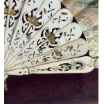 Neoclassical figure fan in display case