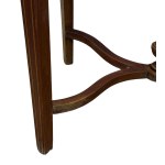 Oval-shaped mahogany table