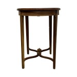 Oval-shaped mahogany table