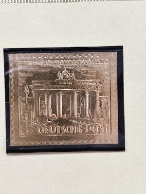 Two limited edition gold-plated stamps 