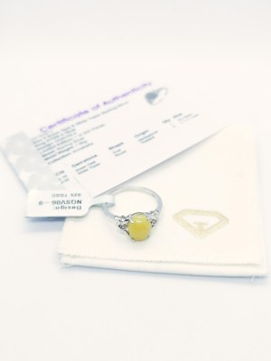 Ring with 1 green opal 2.16 ct, 2 white topazes 0.02 ct, 925 silver, RocksTV certificate