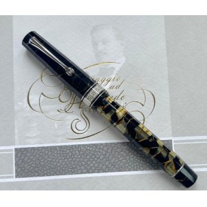 Pen - This Omas Extra Lucens in black and gold celluloid with HT finish...