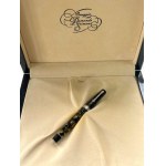 Pen - This Omas Extra Lucens in black and gold celluloid with HT finish...