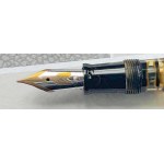 Pen - This Omas Extra Lucens in black and gold celluloid with HT finish...