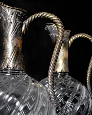 Pair of crystal wine jugs framed in silver, France 1890