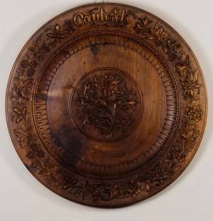 French woodcarving workshop, 19th/20th century, Commemorative decorative plate from the Pyrenees. ca. 1900.