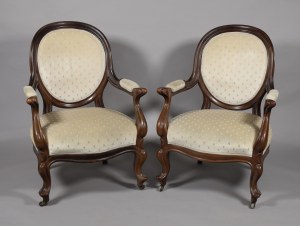 A pair of armchairs in the style of Louis Philippe