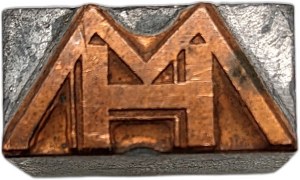 Printing matrix / printing piston / stamp - monogram MH [ printing, bookselling, bookbinding].