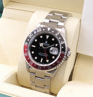 Watches - ROLEX. GMT MASTER II. Reference 16700. Serial U3X...