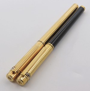 Pens - CARTIER. Lot of 2 ballpoint pens. Bodies and caps...