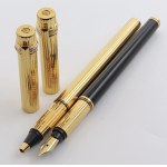 Pens - CARTIER. Lot of 2 ballpoint pens. Bodies and caps...