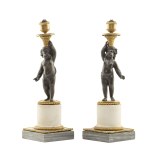 Pair of candlesticks with putti