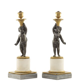 Pair of candlesticks with putti