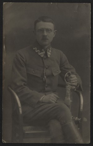 Portrait photograph of Capt. Stanislaw Warcholik in the uniform of the Polish Legions, with a saber and Legion sling [before 1918].